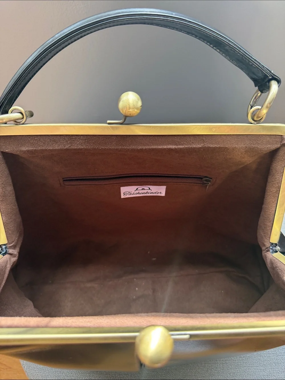 Vintage-Inspired Black Leather Frame-Top Clutch